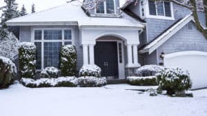 Do You Have Cold Weather Damage to Your Sprinkler System - House in Snow